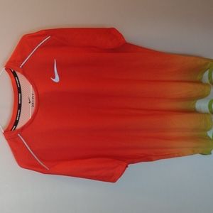 NIKE SAFETY RUNNING SHIRT.  BRIGHTLY COLORED FOR ROADSIDE RUNNING SAFETY.